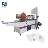 Machine à serviettes hygiéniques automatique triphasée 220v serviette hygiénique faisant la machine