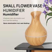 Diffuseur d'arômes à chargement USB Offre Spéciale transfrontalier Style grain de bois grand volume de brume Mini dispositif d'hydratation pour capteur d'air