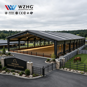 Fabricant de bâtiments sur mesure en acier pour arènes équestres, conçues pour les clubs d'équitation, avec une configuration de structure portique à travée libre. - Product Image 1
