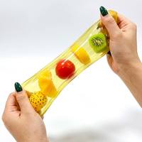 Jouet banane géant souple, boîte de 12, banane en TPR à remontée lente avec balles fruitées à l'intérieur, anti-stress et jouet sensoriel