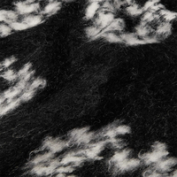 Vente en gros de vêtements d'hiver chauds et personnalisés en tricot noir et blanc cardigan unisexe en tricot jacquard mohair pelucheux pour femme