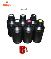 Qinyu tinta Film Transfer DTF UV 500ML 1000ML kualitas tinggi untuk i3200 TX800 XP600 kepala cetak DTF UV