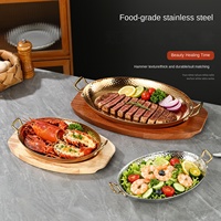 Assiette ovale de luxe en acier inoxydable 304, écologique et durable, martelée, pour steak, idéale pour restaurants, hôtels et événements.