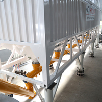 Silo à ciment horizontal portable avec châssis intégré et pieds de support pour un déplacement facile entre les chantiers