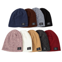 Venta al por mayor de acrílico a cuadros Jacquard de punto aislado Slouchy Knit Oversized Long Winter Slouch Rasta Hat Reggae Cap Beanie para mujeres