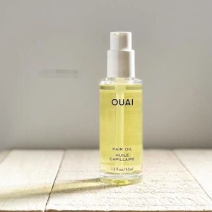 Huile capillaire écologique pour des cheveux lisses, hydratés et réparés, avec protection thermique pour les coiffages et les stylings en salon - Product Image 1
