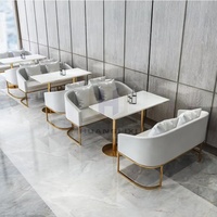 Neues Design Modernes Rundes Café-Sitzgruppen-Set mit Tisch und Stühlen in Weiß und Schwarz für Zuhause & Restaurant