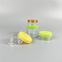 ODM Fournisseur OEM Vente à chaud de l'usine 10g 10ml Pot en plastique transparent avec couvercle à bouchon à vis violet vert bleu pour cosmétiques