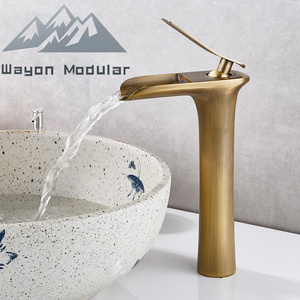 Serie di Rubinetti da Bagno Premium in Ottone: Design a Cascata e a Collo Alto in Ottone Anticato, Oro e Cromo per Progetti di Lusso - Product Image 1