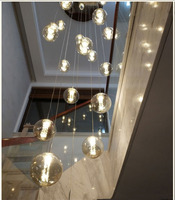 Plafonnier LED suspendu en verre de forme sphérique, design moderne de luxe, idéal pour un salon ou une villa, des escaliers, couleur jaune or