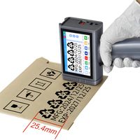 Nouvelle imprimante à jet d'encre en aluminium à main de 25.5mm 600dpi Machine de codage de date d'expiration à séchage rapide 1 an pour cartes bouteilles bois