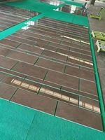 Marbre brun Bagley naturel, base café foncé avec des veines subtiles, pour la décoration des sols et des murs