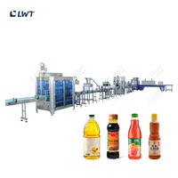 LWT Solution de remplissage liquide intégrée Ensemble complet de remplissage Manchon de capsulage Étiquetage Équipement d'emballage rétractable