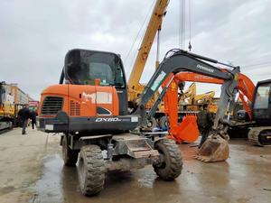 Second Handexcavator Develon DX 60W Fuerte potencia y capacidad de trabajo Sistema de energía fuerte Control de consumo de combustible eficiente - Product Image 5