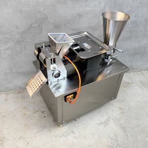 Máquina Automática para Hacer Samosas, Dumplings y Empanadas con Motor Central, Acero Inoxidable de Grado Alimenticio, Capacidad de Producción de 70 Piezas/Min - Product Image 1