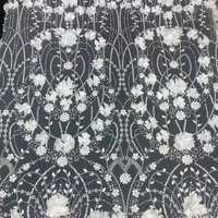 Nouvelle dentelle blanche 3D de luxe brodée de fleurs et perlée pour robe de mariée