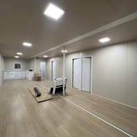 Maison conteneur pliable et extensible sur mesure de 20, 30 ou 40 pieds avec mur rideau en verre et panneaux sandwich en acier pour usage résidentiel