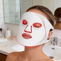 Masque facial LED à photons en silicone, portable, avec chauffage thérapeutique, vente directe d'usine, pour usage domestique
