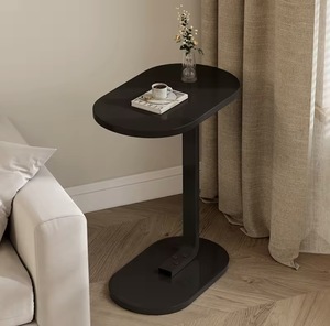 طاولة قهوة دائرية بقاعدة دعم على شكل قوس يمكن وضعها أسفل الأريكة. - Product Image 2