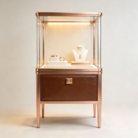 Luxuriöse Roségold-Glasvitrine für Schmuck, LED-Beleuchtung, Lederumwickelte Schublade, Anpassbar, für Hochwertige Juweliergeschäft-Präsentation