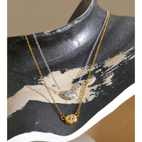 Collier pendentif JINYOU 8363 en zircone cubique, bordure texturée irrégulière effet lave, acier inoxydable plaqué or PVD