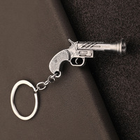 Porte-clés en métal modèle petit canon western et petit pistolet R45, pendentif jouet pistolet vintage exquis, décoration de sac à dos tendance, cadeau