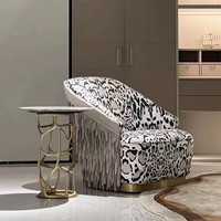 Fauteuil lounge italien fait main à imprimé léopard avec franges et base en acier inoxydable poli, mobilier de salon de villa