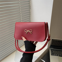 Sac à bandoulière 2025 Summer Underarm Popular Elegant Bow Sling Bag pour les femmes