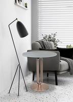 Table d'appoint ronde de luxe en acier inoxydable et en fonte avec base en or rose pour les pieds de meubles de salon et de chambre à coucher en plein air