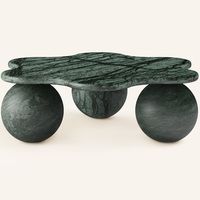 Table basse ronde moderne de style Wabi-sabl en travertin beige avec socle bas pour salon