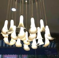 Lustre moderne en céramique en spirale en forme de feuille, luminaire suspendu personnalisé pour villa, escalier, hall d'hôtel, décoration de luxe