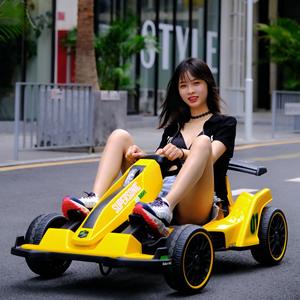 Voiture électrique pour enfants Samate, quadricycle rechargeable jaune avec siège et fonction drift pour garçons et filles - Product Image 1