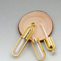 Tubes de brillant à lèvres vides 5ml avec bouchon couronne en ABS, personnalisables avec logo et couleur, vente en gros OEM ODM