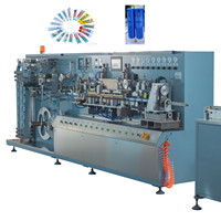 Machine de fabrication de tubes de dentifrice laminés
