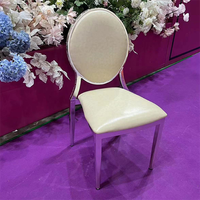 Chaise de mariage extérieure moderne, nouveau design 2025, avec dossier ovale, en métal doré, empilable et imperméable, portable pour hôtels et salons