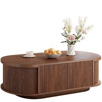 Table basse ovale en bois d'ingénierie de style Mid-Century Modern avec portes à charnières cannelées et double plateau rabattable à couvercles cachés, mobilier de salon