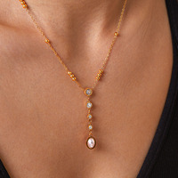 Collier élégant avec pendentif ovale allongé en perle, chaîne latérale perlée et breloque pendante, bijou intemporel de qualité supérieure TGXL14164
