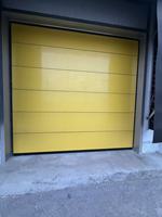 Porte sectionnelle industrielle à levage vertical robuste pour usine