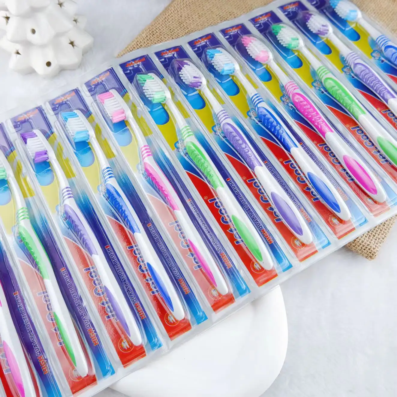 OEM/ODM 12 pieces in one blister wholesale cheap toothbrush tongue cleaner reusable adult toothbrush