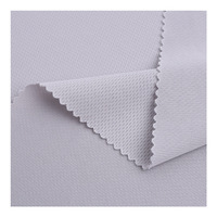 100% polyester 75D/36F tricoté tissu oeil d'oiseau maille Jacquard à séchage rapide pour T-shirts uniformes de balle PU imperméable pour auvents