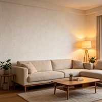 Grande dalle de pierre artificielle blanche à texture tissée, découpe sur mesure pour la décoration murale des salons, chambres, salles de bain et cuisines.