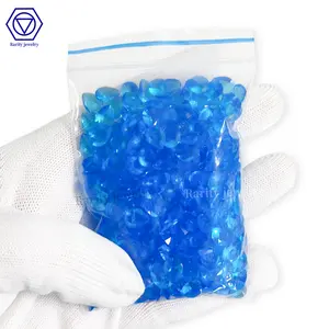 Wuzhou Rarity top quality low price blue color pear shape glass loose gemstone for jewelry making