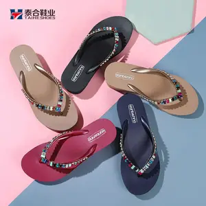 Nuovo strass tacchi alti infradito zeppe pantofole piatte di alta qualità in PVC gomma da donna all'ingrosso tinta unita Custom