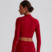 Veste de sport de yoga respirante à manches longues et fermeture éclair à haute élasticité pour femmes de style européen et américain pour le printemps et l'automne grande taille