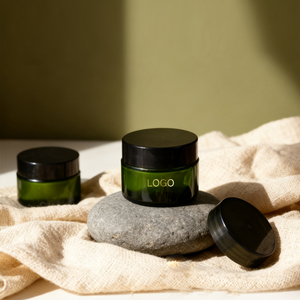 Envase cosmético redondo de lujo Premium, Mini Crema para Ojos vacía recargable, crema facial, tarro de vidrio verde con tapas negras - Product Image 4
