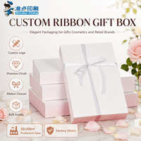 Boîte cadeau personnalisée en carton de haute qualité avec ruban, fabriquée à partir de matériaux recyclés, structure robuste et durable, élégante