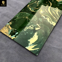 Foshan matériaux de construction mur décoratif intérieur moderne de luxe sol en céramique polie porcelaine dorée carreaux vert foncé marbre