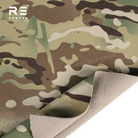 Tissu polaire laminé en polyester et élasthanne camouflage MC avec une sensation imperméable, respirante et douce au toucher pour un manteau d'hiver chaud