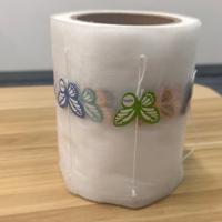 Nouveau design de sachet de thé pyramide avec logo personnalisé sachets de thé triangulaire vides biodégradables rouleau de sachet de thé non tissé en fibre de maïs PLA