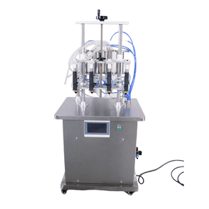 High Quality <b>Perfume</b> Making Processing 4 Heads <b>Perfume</b> Filling Machine 4 Nozzles Vacuum Filling Machine for Liquid - Product Image 1